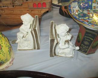 Pair of cherub bookens, 1920s