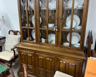 Mid Century Curio cabinet with beveled glass, lighted, on casters by Ethan Allen