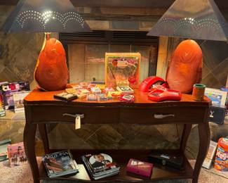 These lamps are magnificent. They are handmade out of wood and have in laid turquoise in them and a Handmade, copper shade! There is a pair