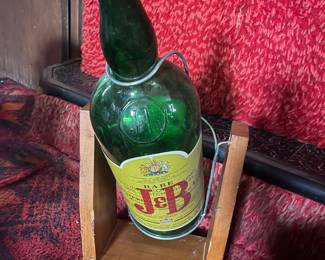Empty JB scotch whisky bottle