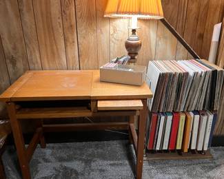 One of the many wood desks in this house, each with a personality of their own.  If you sift through the many record albums you will find a great mid-century modern record stand