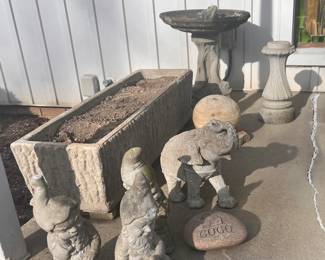 Several outdoor cement planters, statues, bird baths and other misc yard art