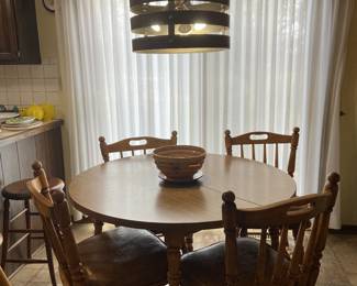 Nice oak dinette with padded cushion seats and one leaf