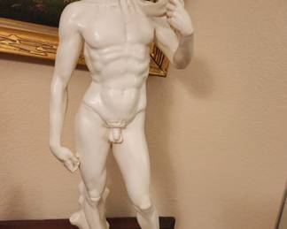 Large vintage statue of Michaelangelo’s David on a marble base. Measures 24” H.