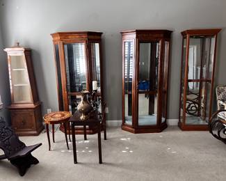 4 curio cabinets