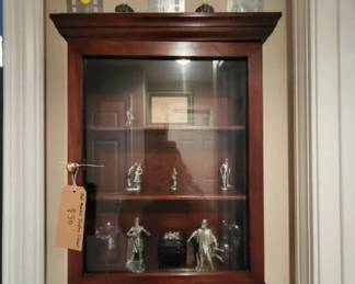 Wall mounted display cabinet and collectibles