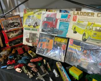 Vintage toys, including metal cars, and planes roadsters trucks trains and model kits