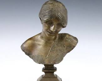 Rocco Milanese, Italian, b. 1852.  A late 19th century Bronze bust of a young woman.  Incised "R. Milanese" signature at shoulder.  Minor wear to patina, small repaired hole at base.  8 1/2" high.