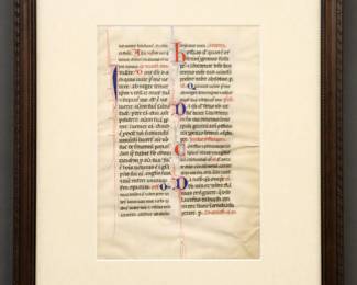 An early 15th century Illuminated Manuscript folio leaf on vellum from an Italian Missal, c. 1400.  Hand-written Latin text in two columns with Red and Blue illuminations.  Annotated note reading "1400 A.D. Italy Missal" frame verso.  Some toning and minor foxing, rippling and some creasing, tear to lower right, not examined out of frame.  Image 7 1/2 x 10 1/2" high, in a modern wood frame, 15 1/8 x 18 3/8" high overall.