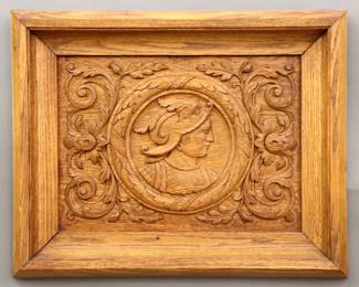A 19th century Renaissance Revival Period carved Oak panel.  Central carved profile portrait medallion of a Knight within a scrolled floral border.  Older finish with minor wear.  Panel 19 x 14" high, in a molded Oak frame with minor joint separation, 26 x 21" high overall.