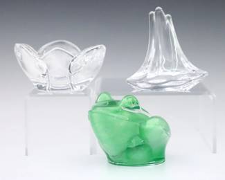 Three pieces of late 20th century Daum Crystal.  Includes a Frog figure with swirled Green interior, a small floriform bowl, and a Sailboat figure.  All with incised "Daum France" signatures.  Minor wear.  Up to 4" high.