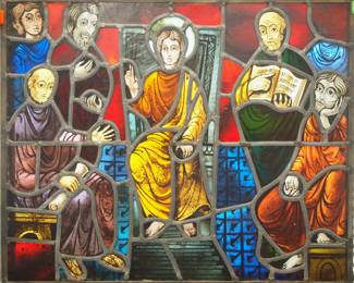A Gothic Revival Stained Glass panel.  Multi-color stained and leaded glass panels with a reverse painted detail depicting Christ in the temple.  Panels intact, some wear to paint, one top border panel slightly loose.  28 1/4 x 23 1/4" high overall.  ESTIMATE $800-1,200