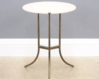 A 1970's vintage Cedric Hartman occasional table.  Circular Travertine marble top on a Brass tri-pod base.  Marked "Cedric Hartman, P 880434, Made In USA" at underside.  Slight wear, original finish with tarnish to Brass.  17" diameter x 23" high overall.