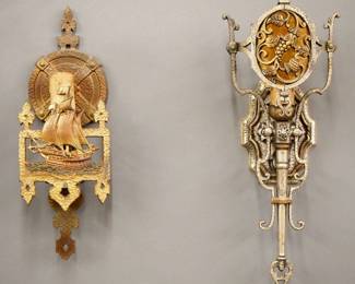 Two early 20th century Lincoln Mfg. wall sconces.  Cast Bronze and Brass bodies with single light and patinated finish, one with "St. Maria" Ship design and polychrome details, the other with Grape Leaf design and Mica liner.  Both marked "Lincoln" Mfg. Co. at back.  Some wear to patina and discoloration to "candles".  Up to 17 1/2" high.