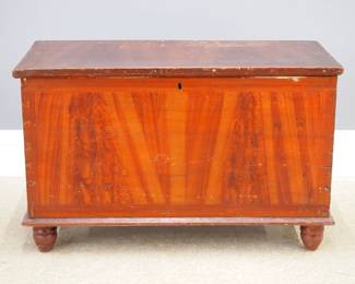 A 19th century Pennsylvania painted blanket box.  Poplar construction with dovetailed body and short turned feet.  Original Red/Yellow grain painted finish.  Minor wear, lacks lock.  18 x 36 1/2 x 22 3/4" high.