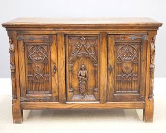 top over two doors with carved tracery and central figural panel, with carved columns surmounted by Apostle figures, Iron hinges and lock.  Old finish with wear, some shrinkage, break to one Iron strap hinge.  48 1/2 x 21 x 33 1/2" high overall.