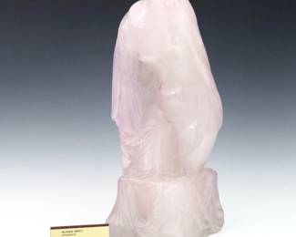A 1970's Daum Pate de Verre sculpture designed by Oliver Brice, titled "Aphrodite".  Three quarter depiction of a nude Aphrodite with draped cloth in tones of Lavender.  Cast "O. Brice" and "Daum France" at base and numbered "38/75" at underside.  Minor wear, small burst bubble at bottom edge.  16" high.