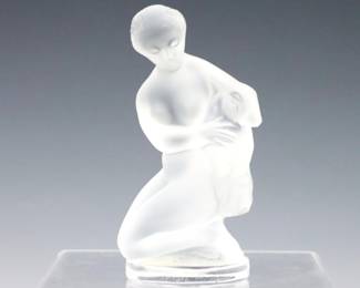 A mid 20th century Lalique frosted Crystal figure, titled "Diana the Huntress".  Original "Crystal / Lalique / Paris" and "Made in France" labels at underside.  Minor wear.  4 1/2" high.  ESTIMATE $50-100