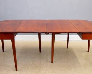 A 19th century American two-part Banquet table.  Cherry construction with "D" ends, reeded top, drop leaves and gate leg supports.  Refinished with minor wear and older repair.  43 1/2 x 46 (88" open) x 29" high overall.