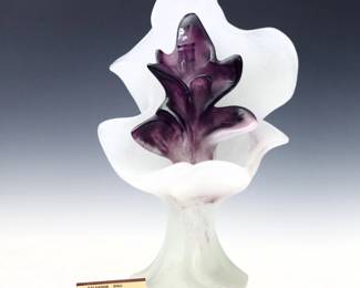 A 1970's Daum Crystal sculpture designed by Salvador Dali, titled "Phonographe Antediluvein".  Stylized organic form with Amethyst and frosted detail.  Cast "Dali" signature at base front and "Daum" on the reverse, numbered "266/300" on the underside.  Minor wear.  18" high.