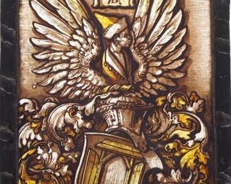 A Gothic Revival German Stained Glass panel after Albrecht Durer, German, 1471-1528.  Single stained and leaded glass panel with reverse painted detail depicting the Durer family Coat of Arms after the 1523 original.  Panel intact, some wear to paint.  6 x 7 3/4" high overall.