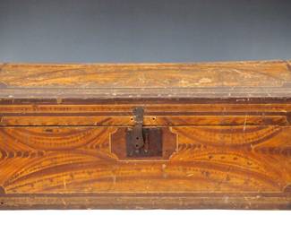 An early 19th century American Federal "Matteson Type" dome top storage box from South Shaftsbury, Vermont.  Basswood construction features a lift-top with interior  dust moldings on a dovetailed body.  Retains the original multi-color painted finish with crotch graining within a "banded" border on top and facade, fanciful crotch graining on sides and back.  Wear and minor paint losses along the edges, lacks the inner dust molding on the left side, old glued repair to back of lid, replaced hasp.  30 x 14 x 12" high overall.