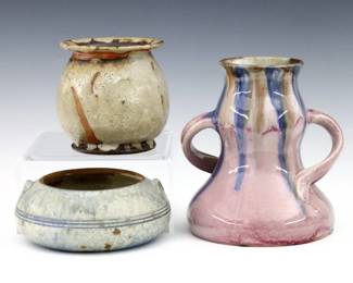 Three early 20th century French and Belgian Art Pottery pieces.  Includes a Belgian Art Nouveau vase with two handles and multi-color drip glaze, a Gres Keramis bulbous vase with mottled Grey/Orange salt glaze, and an Alexandre Bigot bowl with mottled Blue/Grey matte glaze.  Signed "Gres Keramis" and "A Bigot"  at undersides, Art Nouveau vase unmarked.  Minor wear and crazing.  Up to 7" high and 6" diameter.