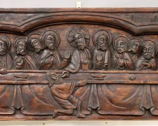 An early 20th century Gothic Revival Period carved Pine panel.  Carved frieze depicting The Last Supper.  Original dark finish some wear, minor shrinkage.  40 1/2 x 3 x 14 1/4" high overall.