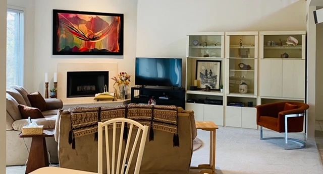 Television, wall unit, love seat, art items, chair
