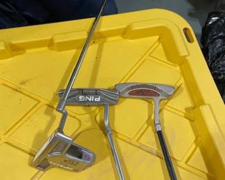 PUTTERS