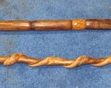 Walking Canes - 1 Has Carved Face & The Other Has Carved Snake