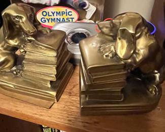 Brass dachshund bookends.