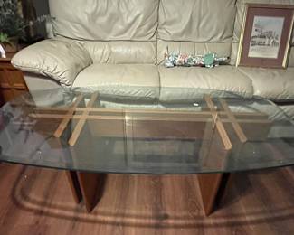 Fabulous "Made in Denmark" coffee table.  Glass top is beveled and super heavy.  