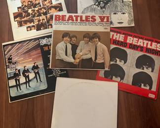 Many, many albums.  This display is all about the Beatles, but these are not the only Beatles albums available.