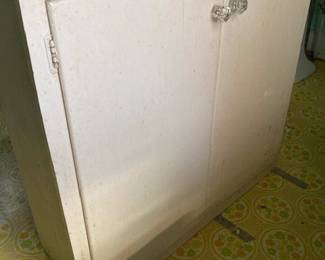 Long and narrow vintage wooden cabinet