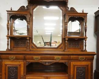 1165	OUTSTANDING MAHOGANY VICTORIAN 2 PART BREAKFRONT W/BEVELED GLASS MIRRORS & CARVED PANELED DOORS, APPROXIMATELY 79 IN X 26 IN X 102 IN HIGH
