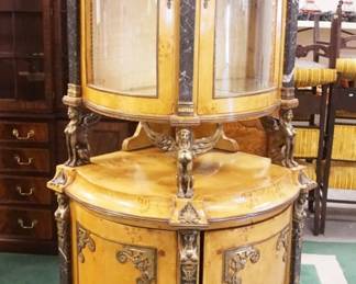 1183	EGYPTIAN REVIVAL 2 PART CORNER CABINET W/MARBLE & ORNATE METAL MOUNT, SOME MIRROR LOSS TO INTERIOR, APPROXIMATELY 27 IN X 80 IN HIGH
