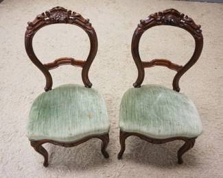 1199	PAIR OF WALNUT VICTORIAN BALLOON BACK SIDE CHAIRS W/UPHOLSTERED SEATS & FRUIT CARVED CREST, SOME STAINING ON UPHOLSTERY
