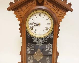 1038	WALNUT VICTORIAN SHELF CLOCK, APPROXIMATELY 23 IN HIGH
