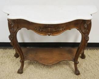 1163	ORNATE VICTORIAN MARBLE TOP PARLOR ENTRY TABLE, DEMILUNE, APPROXIMATELY 47 IN X 24 IN X 33 IN HIGH
