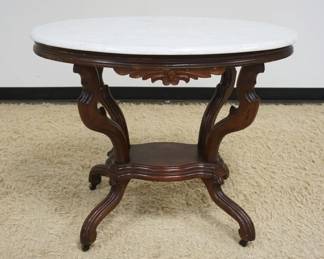 1189	WALNUT VICTORIAN OVAL MARBLE TOP TABLE
