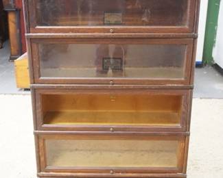 1214	OAK 4 SECTION GLOBE WERNICKE BARRISTER CASE, ONE GLASS MISSING, APPROXIMATELY 34 IN X 13 IN X 53 IN HIGH
