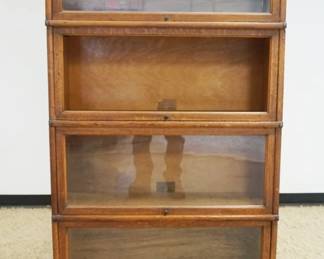1213	OAK 4 SECTION GLOBE WERNICKE BOOKCASE, ONE GLASS MISSING, APPROXIMATELY 34 IN X 11 IN X 71 IN HIGH
