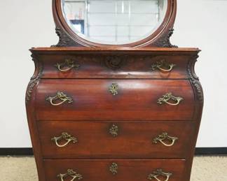1205	MAHOGANY BOMBE 4 DRAWER CHEST W/APPLIED CARVINGS & BEVELED MIRROR, APPROXIMATELY 38 IN X 20 IN X 74 IN HIGH
