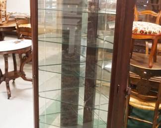 1196	CONTEMPORARY MIRROR BACK CORNER CRYSTAL CABINET, INTERIOR LIT W/ADJUSTABLE GLASS SHELVES, APPROXIMATELY 17 IN X 72 IN HIGH
