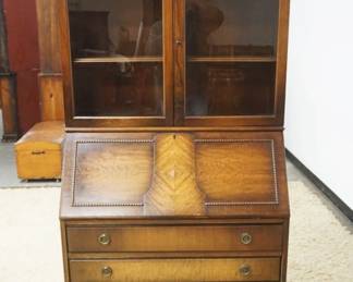 1180	MAHOGANY QUEEN ANNE STYLE SECRETARY DESK W/SHELL CARVED CREST, APPROXIMATELY 35 IN X 17 IN X 77 IN HIGH
