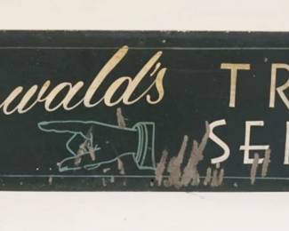 1016	ANTIQUE METAL SIGN GREENWALDS TRAVEL SERVICE, APPROXIMATELY 7 IN X 36 IN
