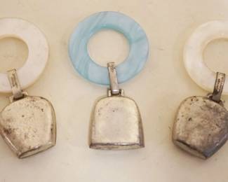 1062	3 STERLING BABY RATTLES
