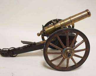 1150	SCALE MODEL OF A GATLING GUN W/WORKING REVOLVING TURRET, APPROXIMATELY 16 IN X 8 IN X 9 IN HIGH
