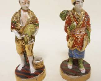 1242	2 ASIAN POTTERY FIGURES, APPROXIMATELY 5 1/2 IN HIGH
